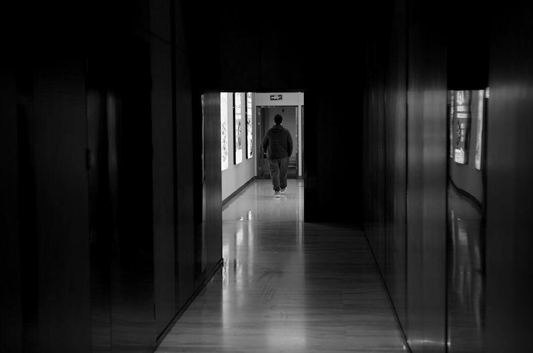 shadowy figure in hallway